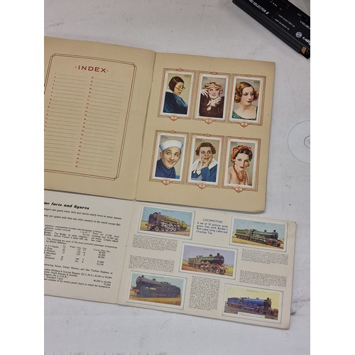 45 - Barbers Tea card album of locomotives & Park Drive cigarette card album of film stars, both complete