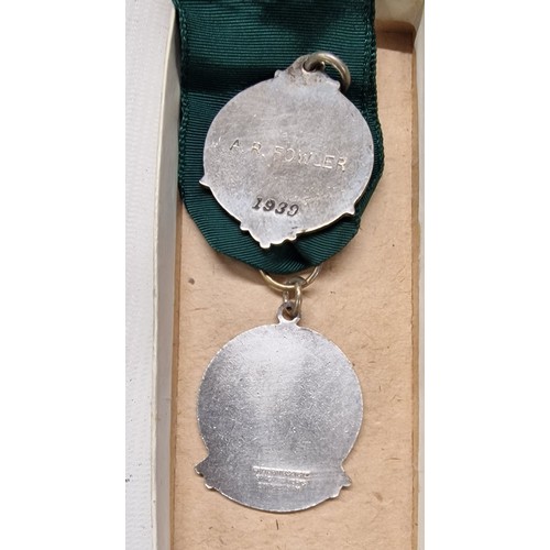 203 - 1945 5 year & 1950 10 year safe drivers medals and 2 year freedom from accident medal