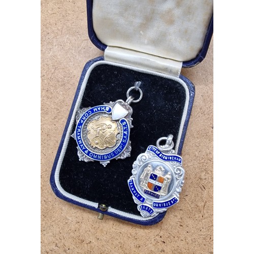 206 - 1934 silver and enamel football medal and 1946 silver and enamel cricket winners medal, both with en... 