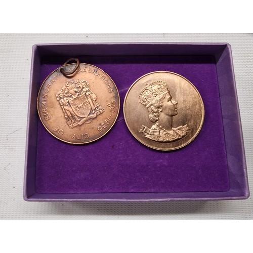 201 - 1935 George V silver jubilee and 1953 coronation medallions