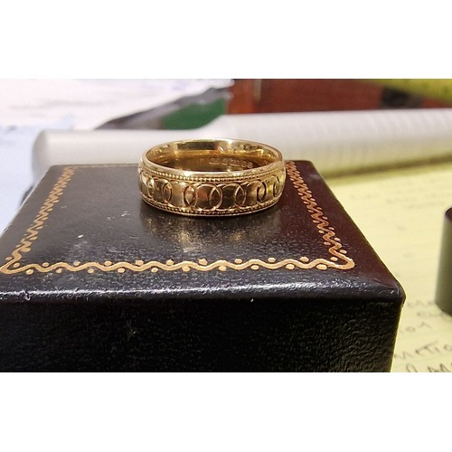 378 - Hallmarked 18 ct ladies ornate band ring size L, engraved on inner 'Cariad Stephen xx' - 7.2 gm