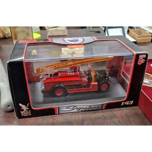 111 - Boxed and mint signature series Worcester fire engine