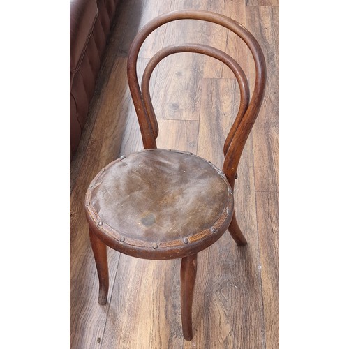 210 - Old childs bentwood chair with studded leather seat