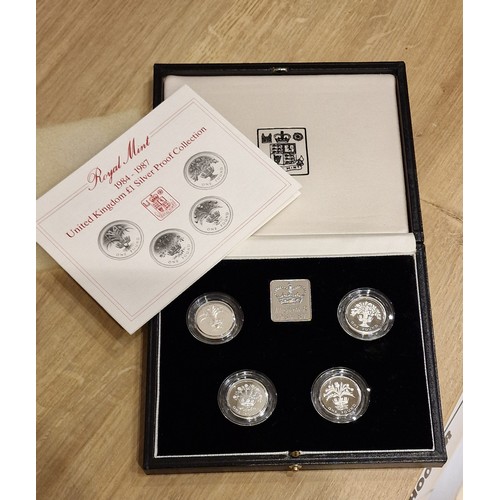 405 - Cased Royal Mint 1984-1987 United Kingdom £1 silver proof piedfort collection coin set