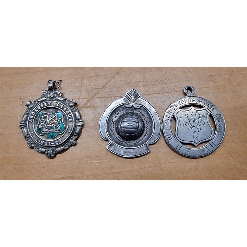 192 - 3 x various hallmarked silver football medals