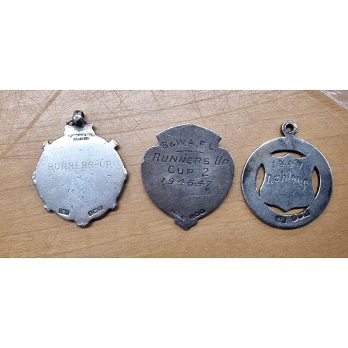 192 - 3 x various hallmarked silver football medals