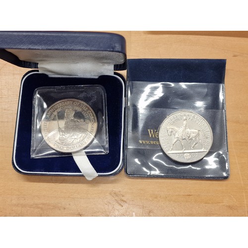 207 - 2002 commemorative coin in pouch and 1973 Cook Islands two dollar coin in case