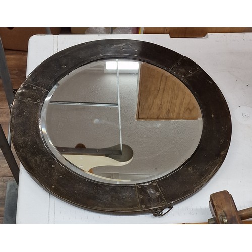 179 - 54 cm diameter Arts and Crafts copper frame, bevelled glass wall mirror