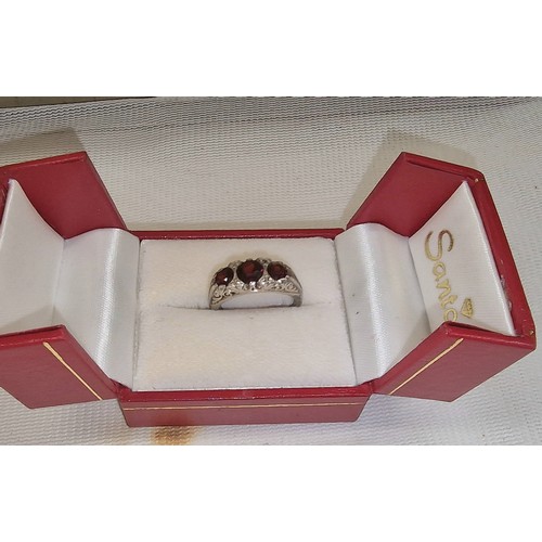 516 - Vintage silver stamped ruby trilogy ring size