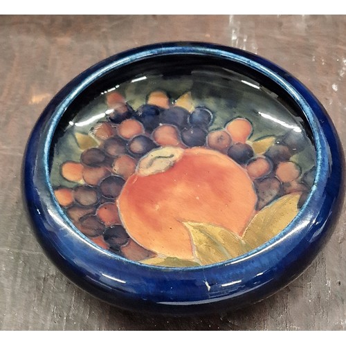 101 - 11 cm diameter old Moorcroft pomegranate dish - crack on edge as shown