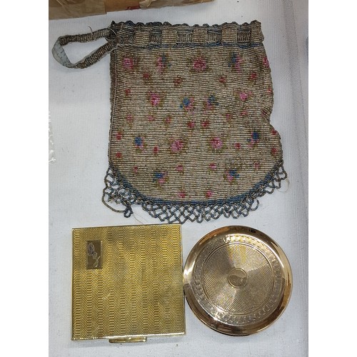 153 - Early 1900's micro bead purse with 2 x gilt compacts