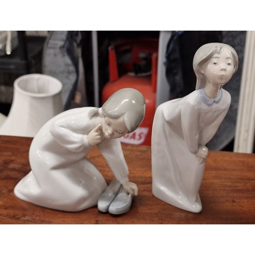 85 - 2 x Lladro young girl in nightie figures