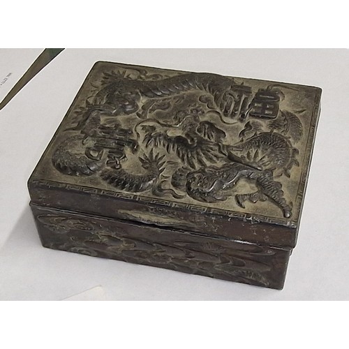 63 - Bronze Chinese cigarette box with wooden lined inner and raised dragon patterning