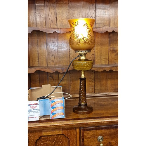 233 - 71 cm tall amber glass oil lamp with shade, converted to electric in working order