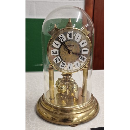 69 - Haller Germany brass and glass domed anniversary clock