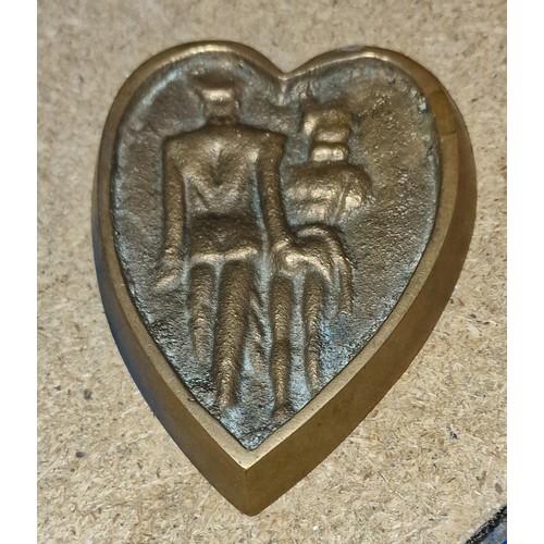 29 - 3 x 4” vintage brass heart shaped ‘naughty’ Dutch ashtray/paperweight