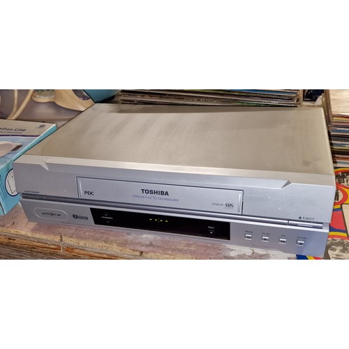 63 - Silver Toshiba VCR model V232UK, powers up but untested and no remote control