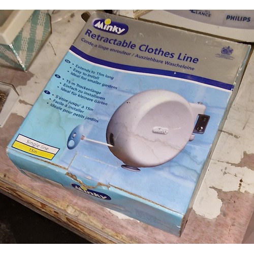 65 - Boxed and looks unused Minky, up to 15 metre, retractable clothes line