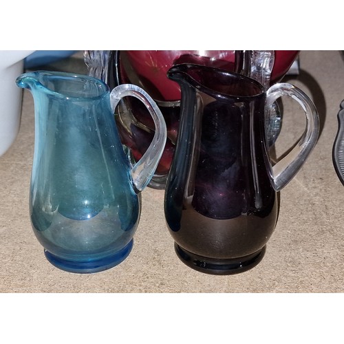 193 - Pair of 11.5 cm tall small hand blown pitchers/jugs