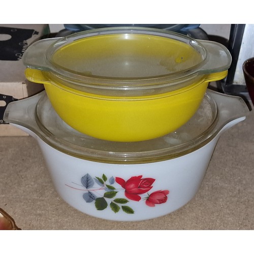 198 - 2 x retro Pyrex pots with lids being opaline floral and bright yellow