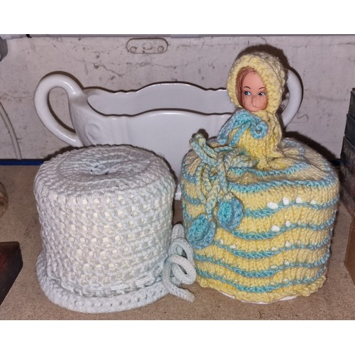 213 - 2 x vintage hand knitted toilet roll covers including 1 with doll