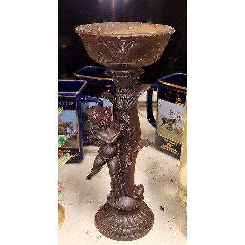 231 - Approximately 28 cm tall bronze look cherub composite candle holder