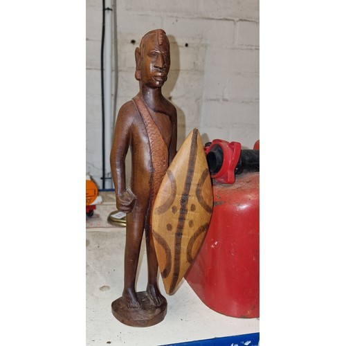 236 - 33 cm tall vintage carved wooden African tribesman figure with shield but no spear