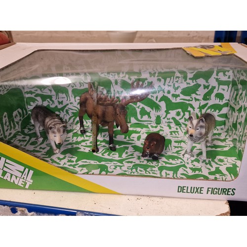 238 - New and boxed Animal Planet Deluxe North American animals being 2 x wolves, moose and beaver