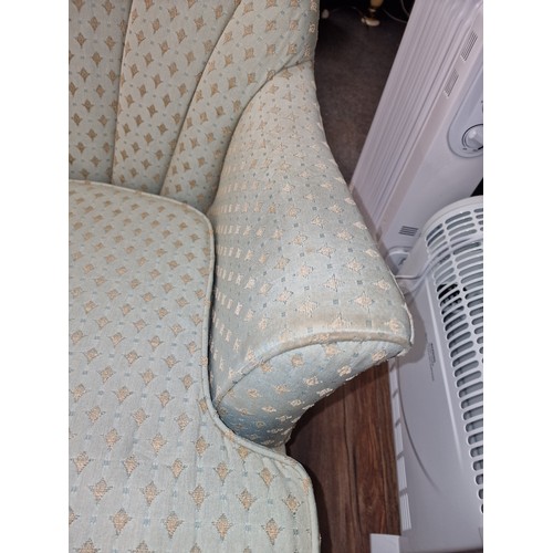 134 - Vintage shell back armchair with arm cushion