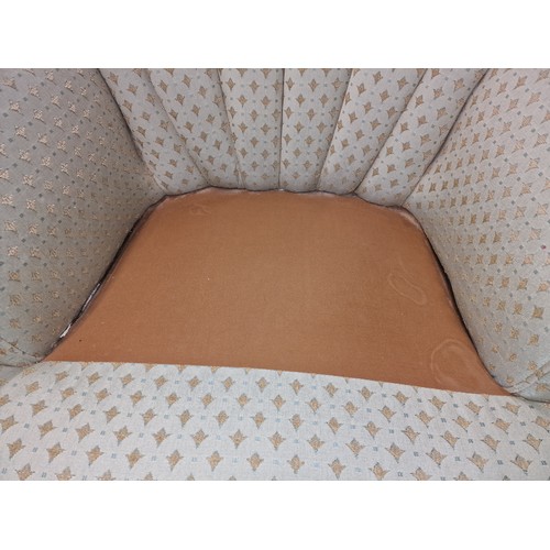 134 - Vintage shell back armchair with arm cushion