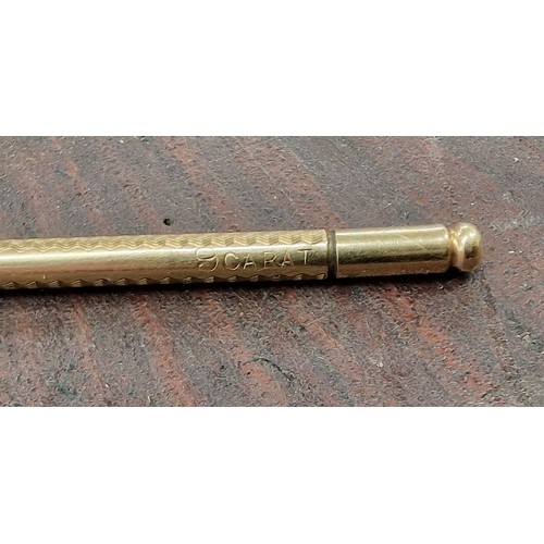 194 - 9 ct stamped gold self propelling pencil, approximately 9 cm long - 5.67 gm