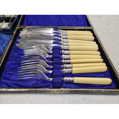 184 - 2 x cased fish knife and fork sets and 1 x cased dessert/cake set