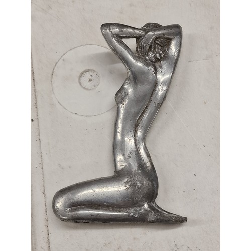 272 - 14.5 cm tall chrome plated Art Deco nude female car mascot with 'slender buttocks'