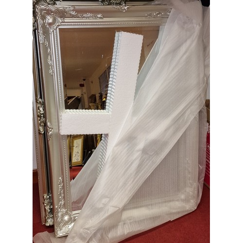 101 - New 77 x 107 cm ornate silver frame, bevelled glass wall mirror