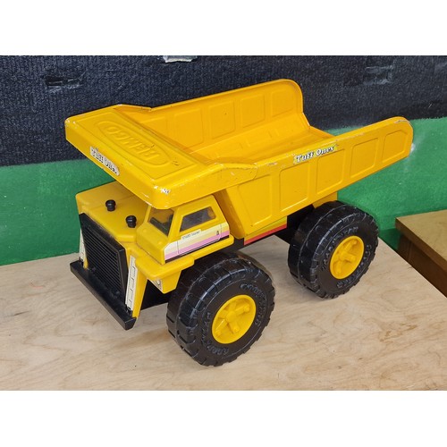 148 - Boxed as new Power Horse large scale remote control dumper truck and Remco Tuff Ones toy model dumpe... 