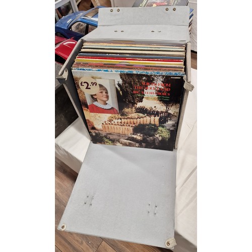 144 - Portable vinyl album carry case with 37 x assorted artist and compilation vinyl albums in varying co... 