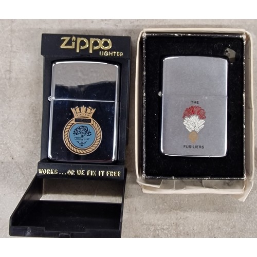 26 - Boxed Fusiliers and cased HMS Hermione as new Zippo lighters