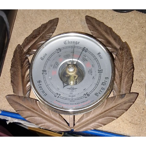 54 - Retro 4” diameter Shortland wall barometer in metal laurel wreath frame