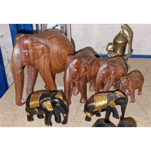 56 - Graduated family of 4 x carved wooden Indian elephants and pair of decorated wooden Indian elephants