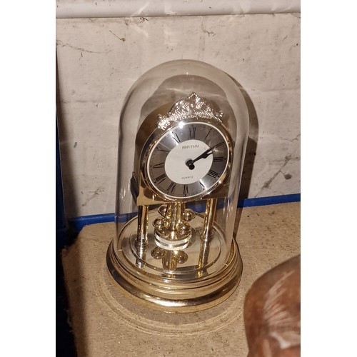 57 - Rhythm quartz plastic domed anniversary clock