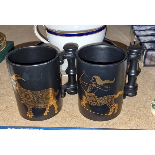 77 - 2 x Portmeirion Pottery signs of the zodiac mugs – Capricorn and Sagittarius