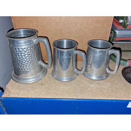 118 - Pair of 4” Pinder Bros and 5” BPC craftsmen made pewter tankards