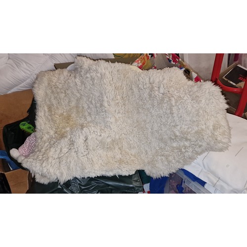 189 - Approximately 34 x 26” vintage sheepskin rug, no smells or stains but will benefit from freshen up