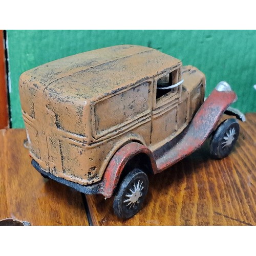 106 - 14 x 6 x 7.5 cm painted cast model of old delivery van with moving wheels