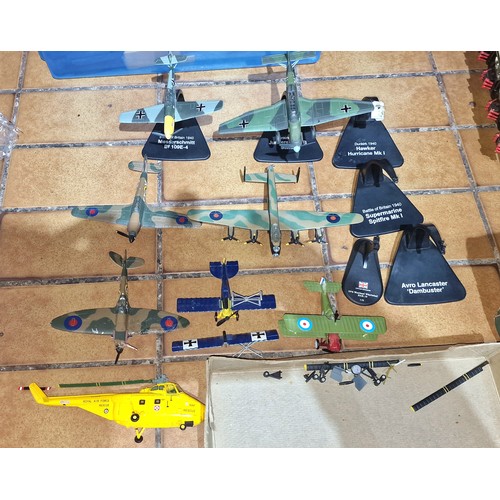 77 - Collection of assorted model fighter planes and helicopter in varying conditions, to include 2 WWII ... 