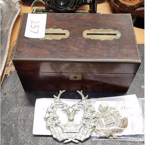 157 - Vintage wooden two section and compartment coin box with 2 x military badges