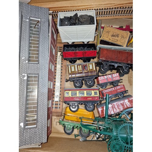 295 - Model railway bundle of 1 x tin steam engine, carriages, rolling stock and other accessories