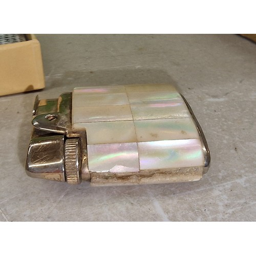 348 - Retro boxed and mint Sarome super lighter and other mother of pearl encased Ronson ladies purse ligh... 