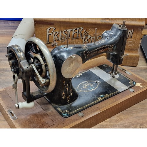 237 - Antique Frister & Rossmann hand crank sewing machine with wooden case (no key) - turns but stiff and... 