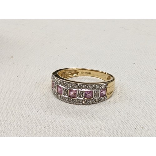 426 - 18 carat gold ruby and 1/2 carat diamonds ring size L